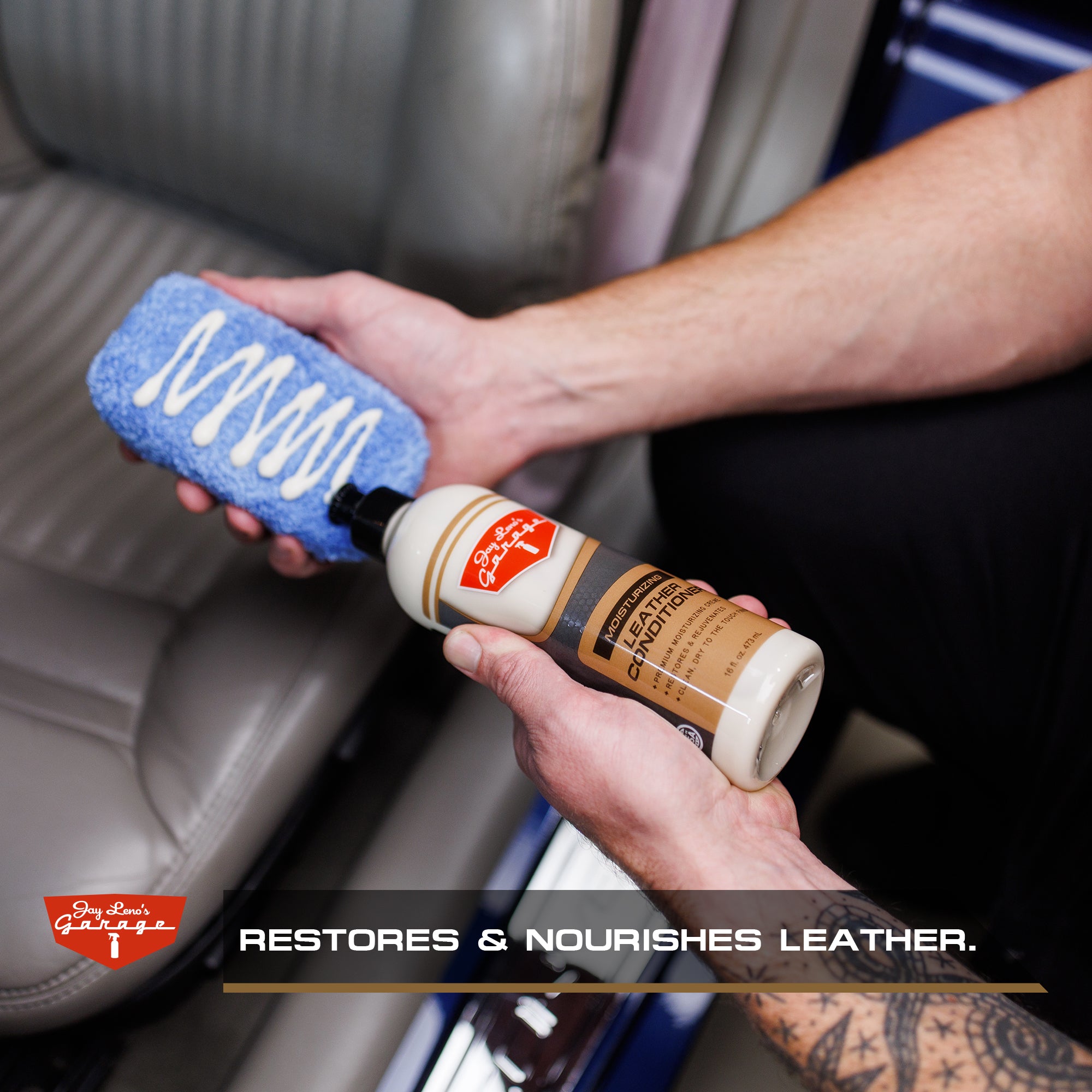 Person holding Jay Leno's Garage Leather Conditioner and applying to an applicator pad